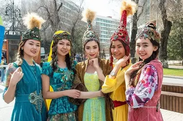 kazakh-girls-in-traditional-outfit-celebrating-nauryz-v0-n4bm6qvrhjo61.webp