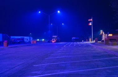Purple_LED_Street_Lights_at_Ladora_Iowa_I-80_Rest_Area_(52953972858).jpg